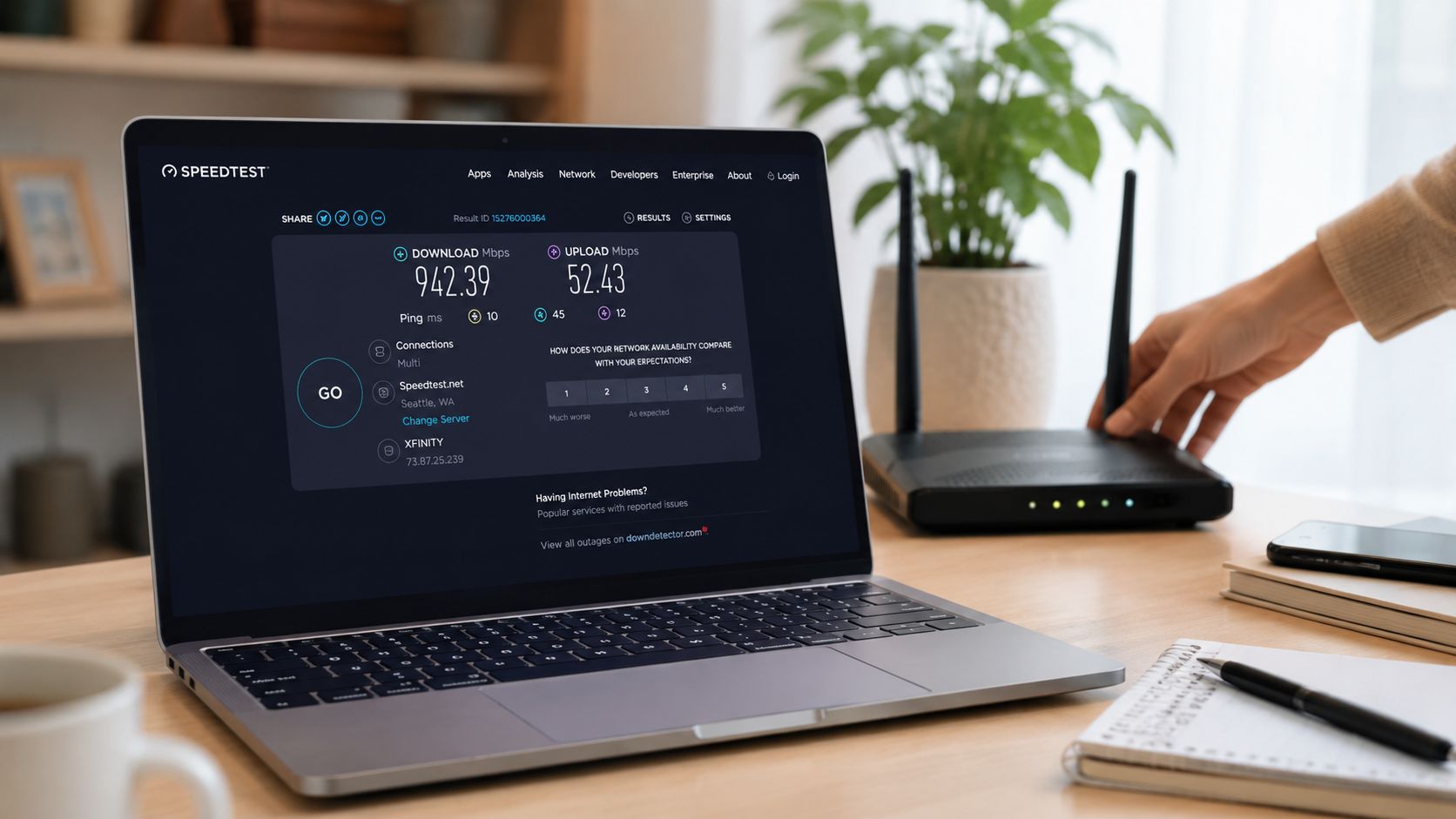 A laptop showing a fast internet connection speed test result with a wireless router in the background.
